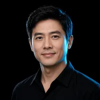 James K. in a black shirt